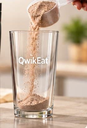 QwikEat powder being poured into a clear glass